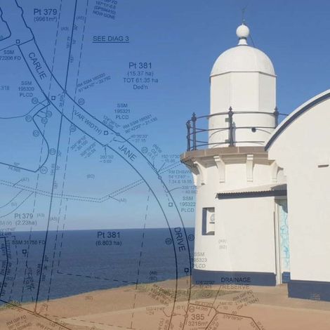 Survey plan overlay on background of lighthouse building and ocean horizon